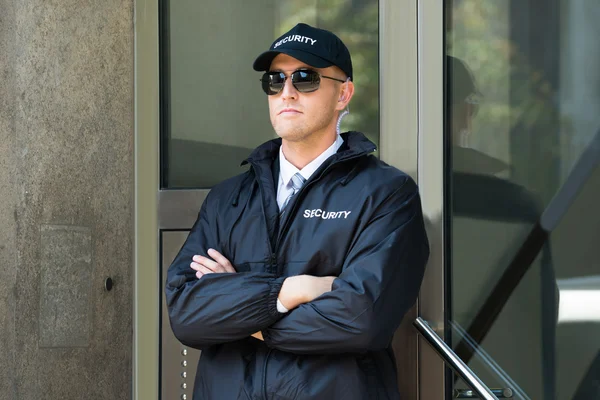 Male Security Guard Standing At The Entrance — Stock Photo, Image