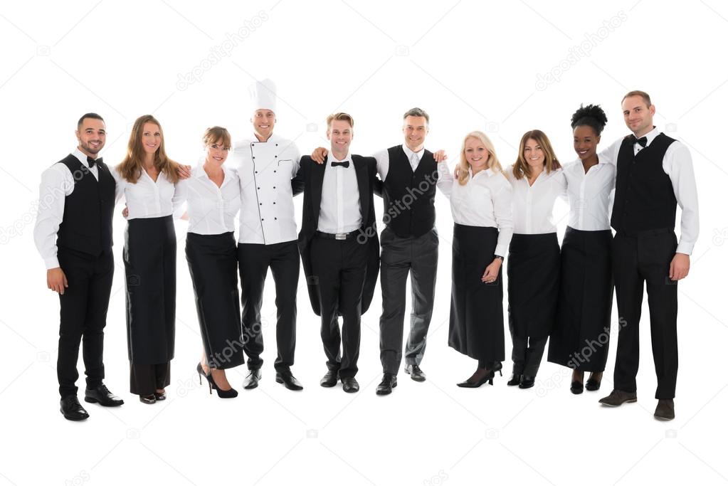 Restaurant Staff Standing With Arms Around