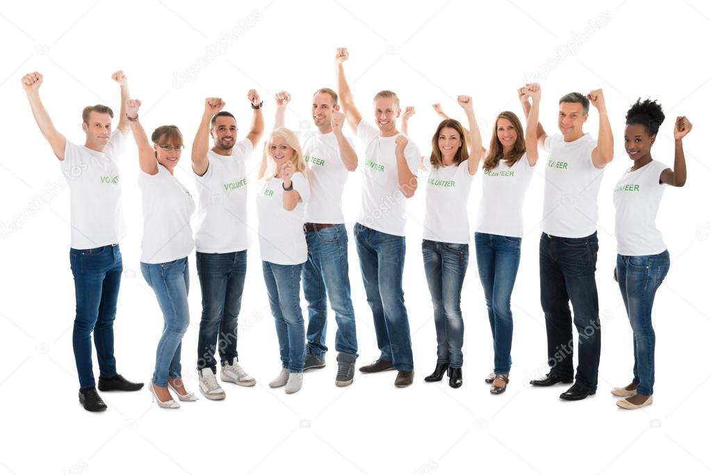 Confident Volunteers With Arms Raised
