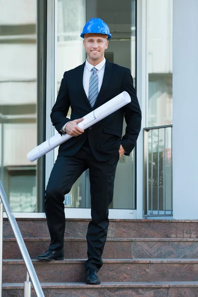 Architect Holding Blueprint In His Hand — Stock Photo, Image