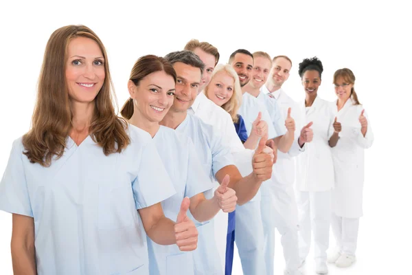 Medische Team weergegeven: Thumbs up In Line — Stockfoto