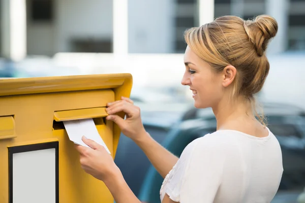 Woman Inserting Letter In Mailbox — Stock Photo, Image