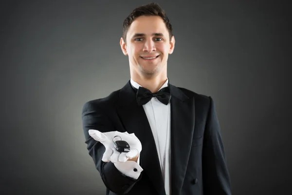 Happy Waiter Giving Car Keys — Stock Photo, Image