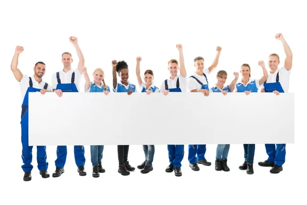 Happy Janitors  Holding Blank Billboard — Stock Photo, Image