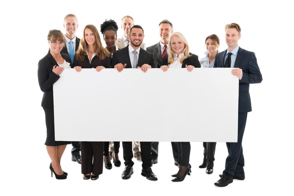 Business Team Holding Blank Billboard