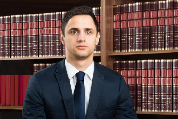 Confident Lawyer Against Bookshelf — Stock Photo, Image