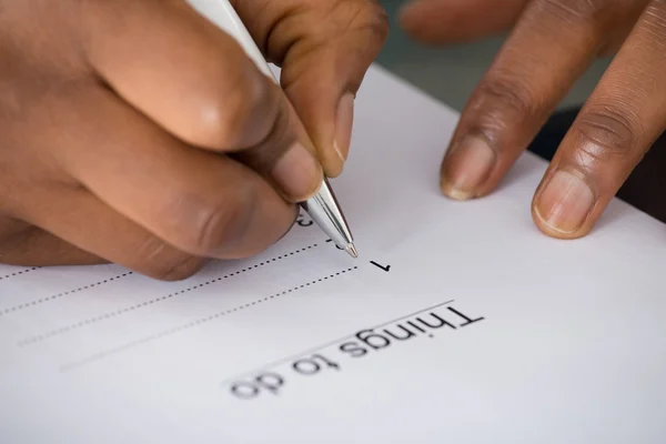Person's Hand Writing Things To Do List — Stock Photo, Image