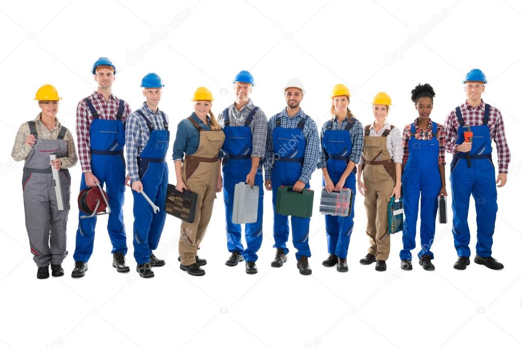 Confident Carpenters Carrying Toolboxes