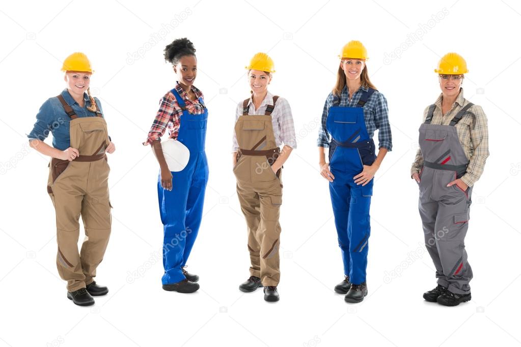 Multi ethnic Carpenters Standing In Row