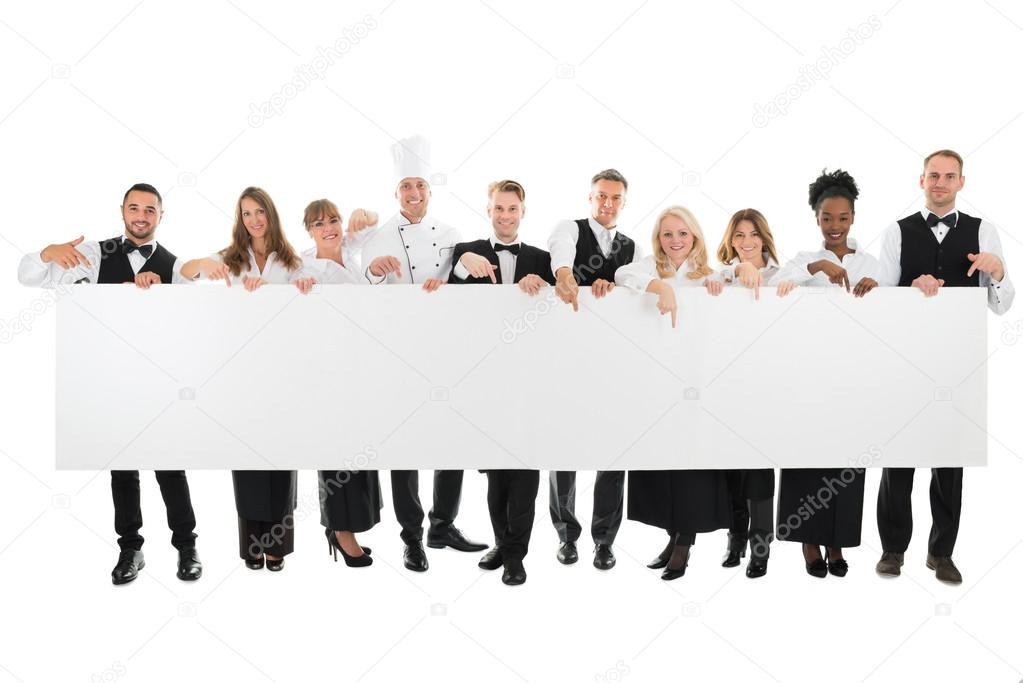 Restaurant Staff Holding Blank Billboard