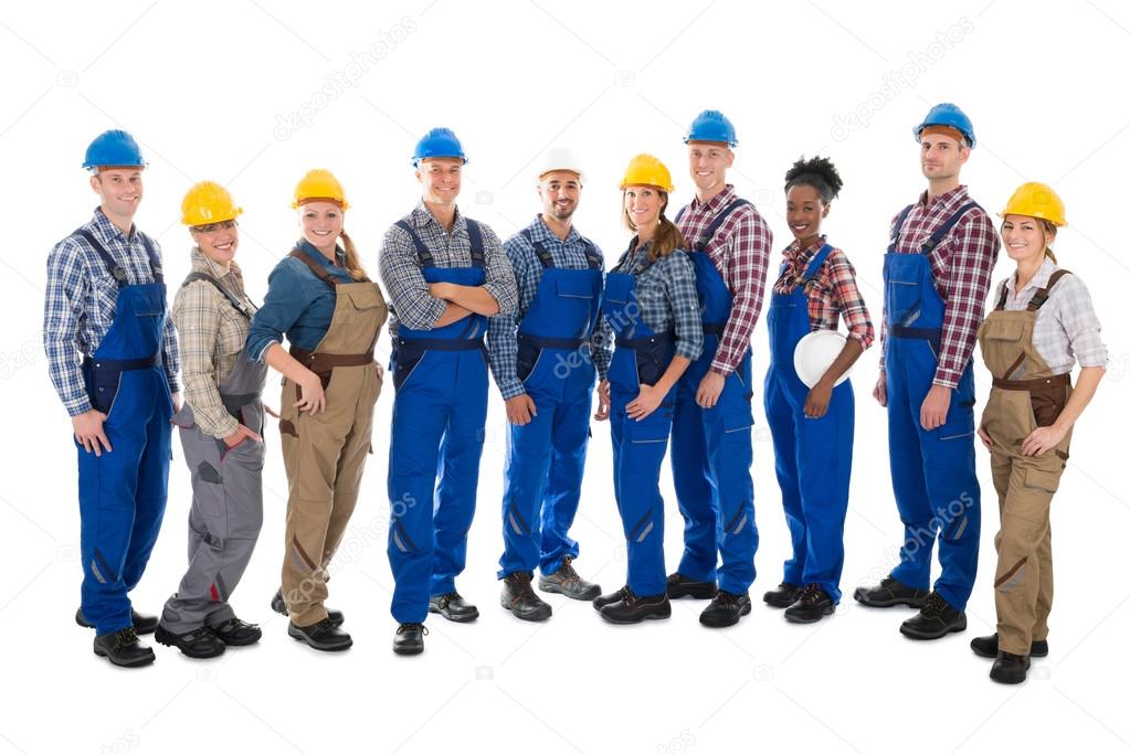 Confident Carpenters Standing In Row