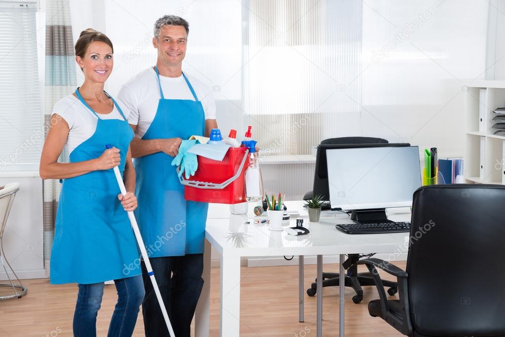Two Cleaners With Cleaning Equipments