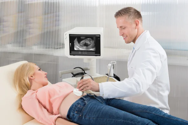 Doctor Moving Ultrasound Transducer — Stock Photo, Image