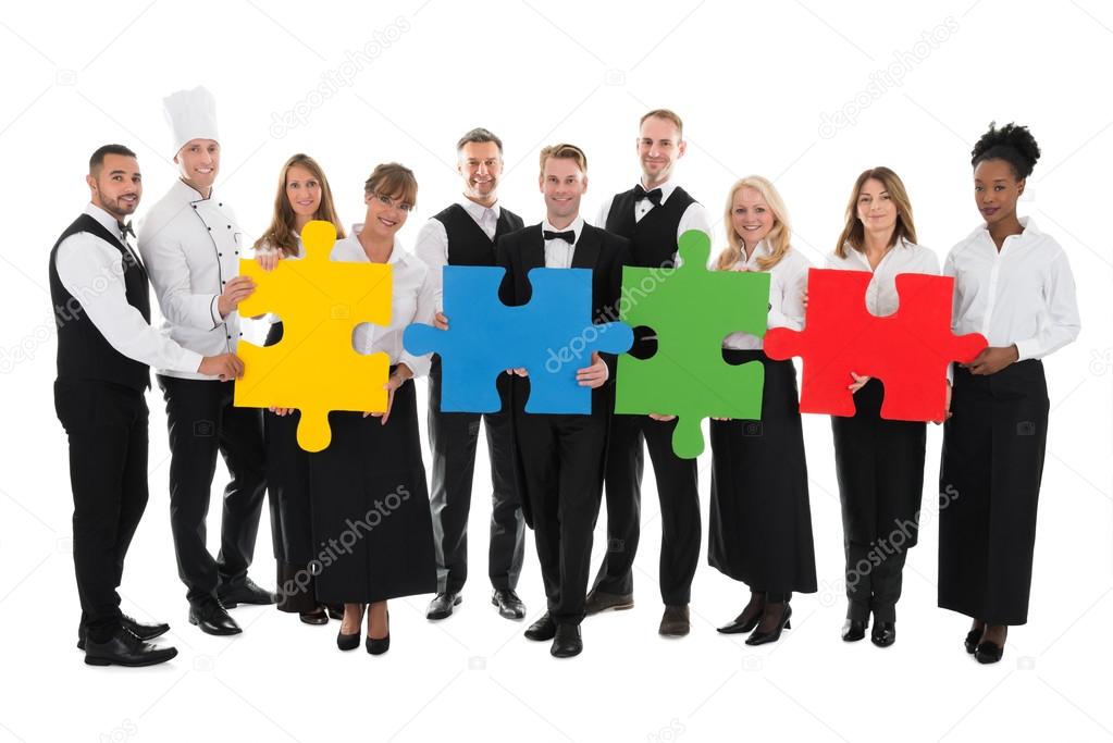 Restaurant Staff Joining Jigsaw Pieces