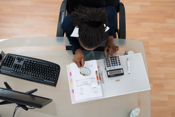 Businesswoman Looking Through Magnifying Glass — Stock Photo, Image