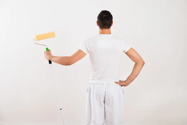 Man Holding Paint Roller — Stock Photo, Image