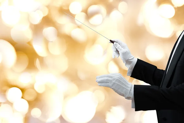 Muziek Conductor's Hand met Baton — Stockfoto