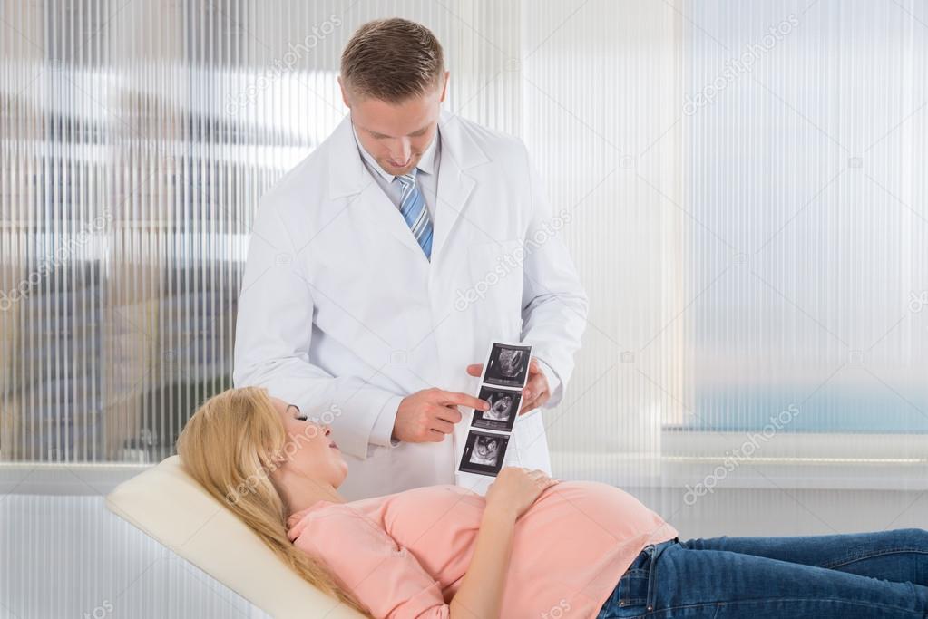 Young Doctor Showing Ultrasound Scan