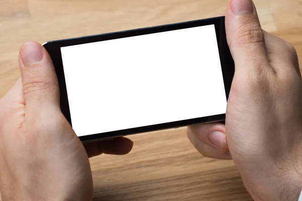 Businessman Holding Smart Phone — Stock Photo, Image