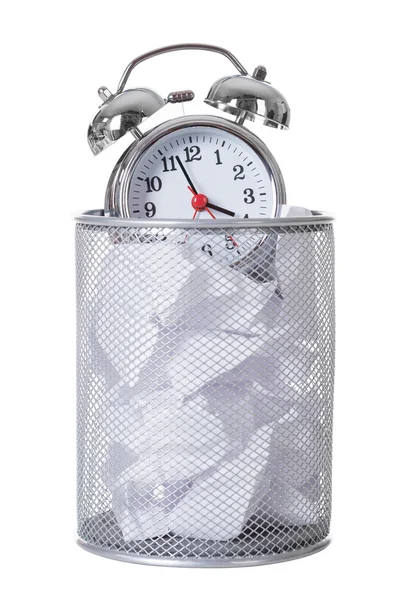 Alarm Clock On Papers In Dustbin — Stock Photo, Image