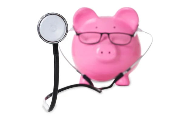 Piggybank With Stethoscope And Eyeglasses — Stock Photo, Image
