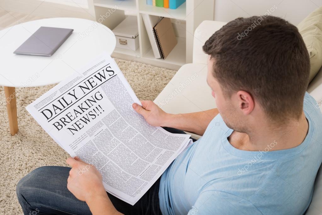 Man Reading Breaking News