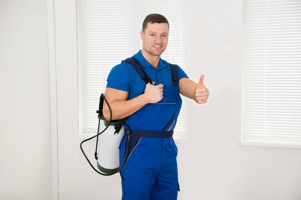 Worker Carrying Pesticide Container — Stock Photo, Image