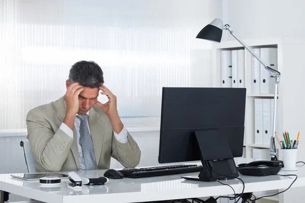 Mature Businessman Suffering From Headache — Stock Photo, Image