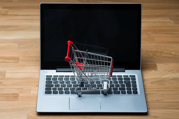 Shopping Cart On Laptop — Stock Photo, Image