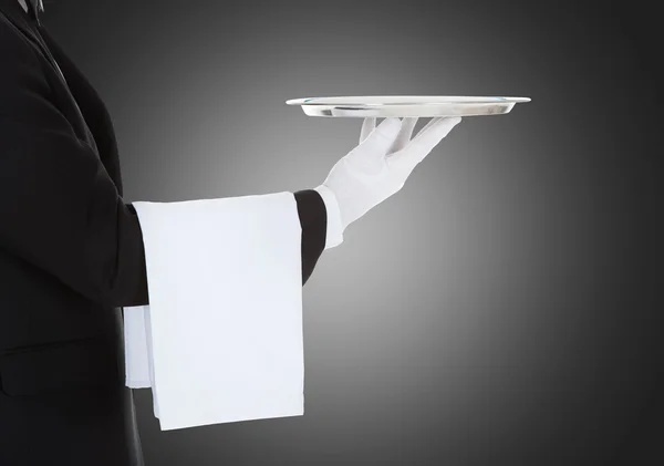 Waiter Holding Empty Silver Tray — Stock Photo, Image