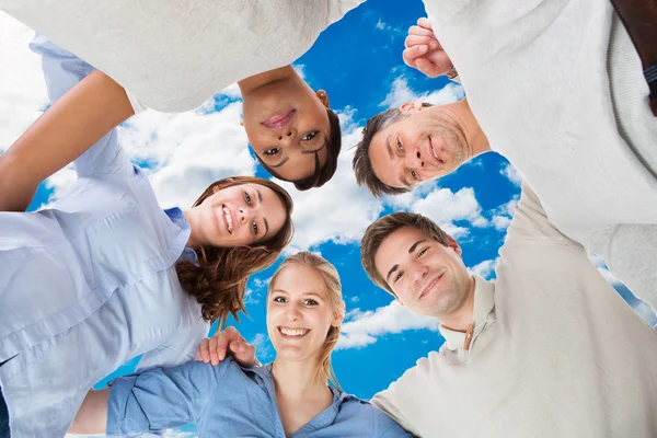 Confident BusinessTeam Forming Huddle — Stock Photo, Image