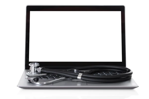 Nahaufnahme von Stethoskop auf Laptop — Stockfoto