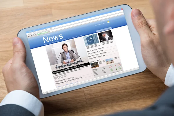 Businessman Reading News On Digital Tablet — Stock Photo, Image