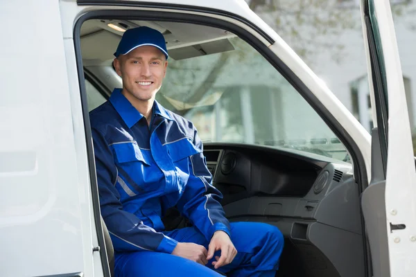 Portrait Of Happy Technician Sitting In Van — Stock Photo, Image