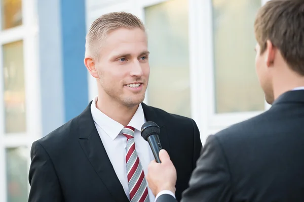 Journalist Taking Interview Of  Businessman — Stock Photo, Image