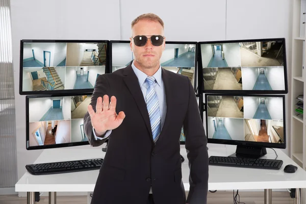 Security Manager Gesturing Stop Sign — Stock Photo, Image