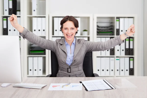 Successful Businesswoman At Desk Royalty Free Stock Photos