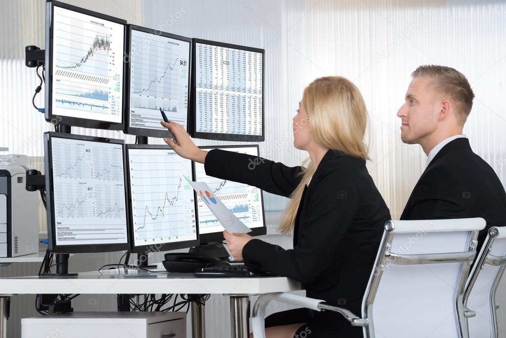 Financial Workers Analyzing Data