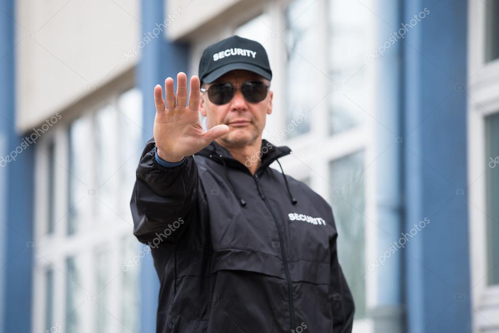 Security Guard Making Stop Gesture