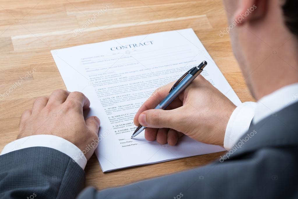 Businessman Signing Contract Document