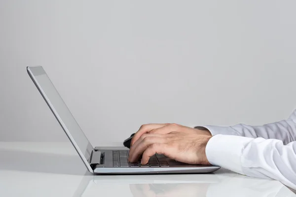 Businessman Using Laptop At Desk — Stock Photo, Image