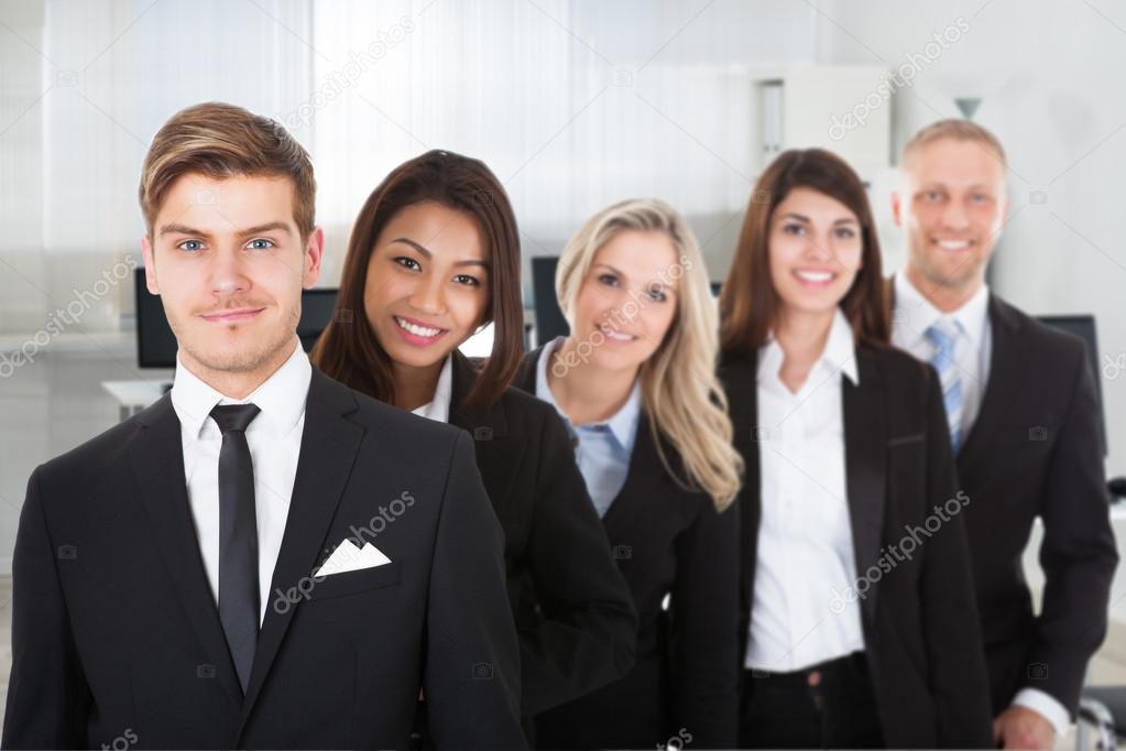 Multiethnic Professionals Standing In Row