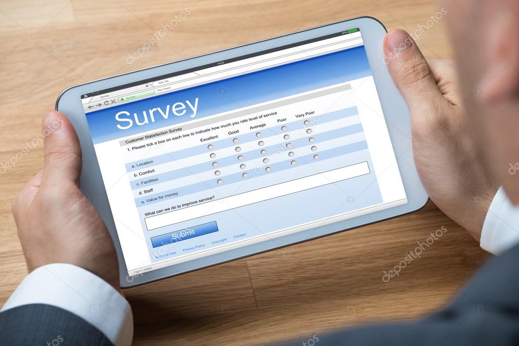 Businessman Giving Online Survey