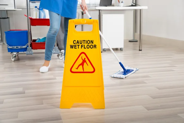 Janitor Mopping Floor By Wet Caution — Stock Photo, Image