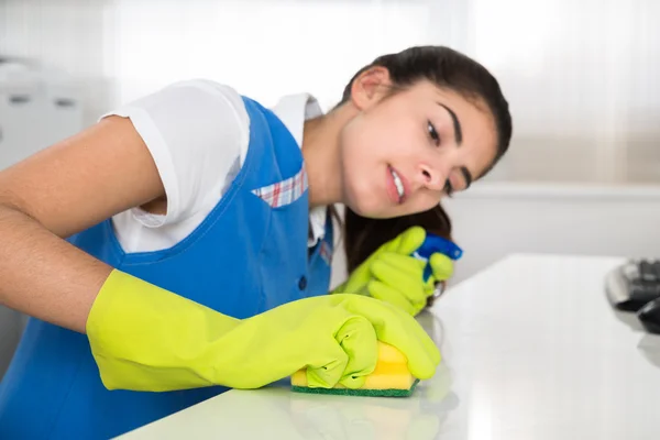 Janitor Cleaning Desk With Sponge — Stock Photo, Image