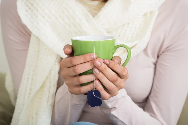 Woman Holding Tee Mug