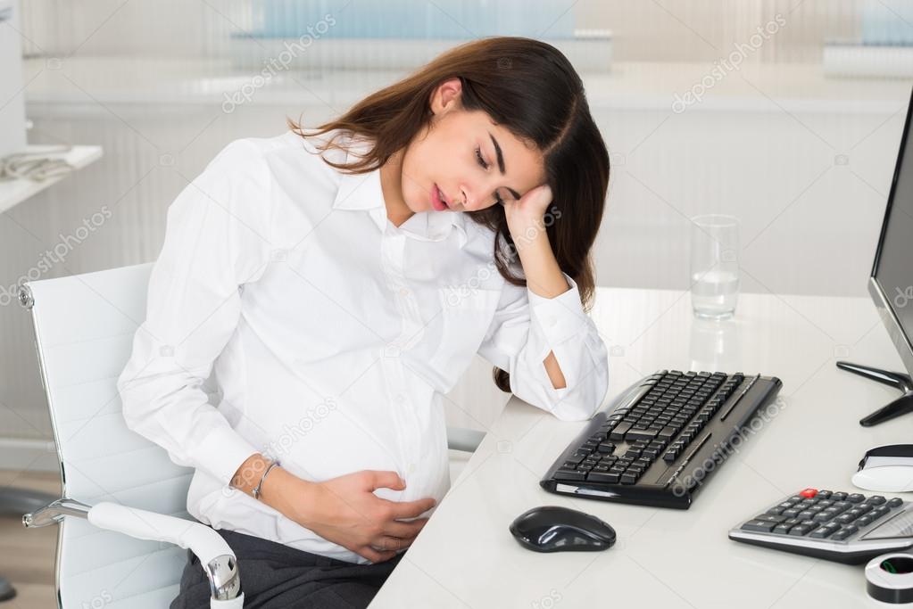 Pregnant Woman S At Computer Desk — Stock Photo © AndreyPopov 98711382