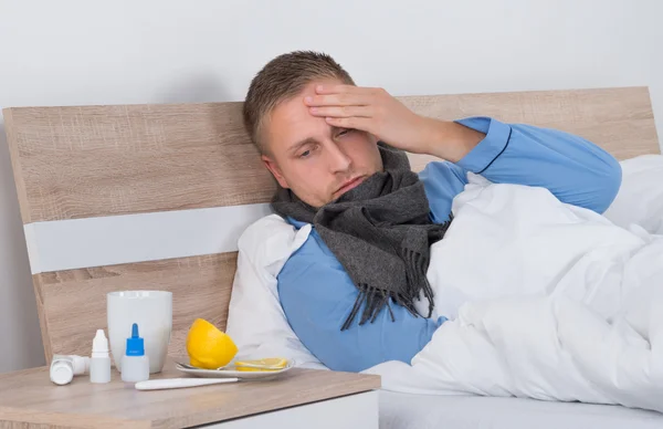 Young Man Suffering From Headache — Stock Photo, Image