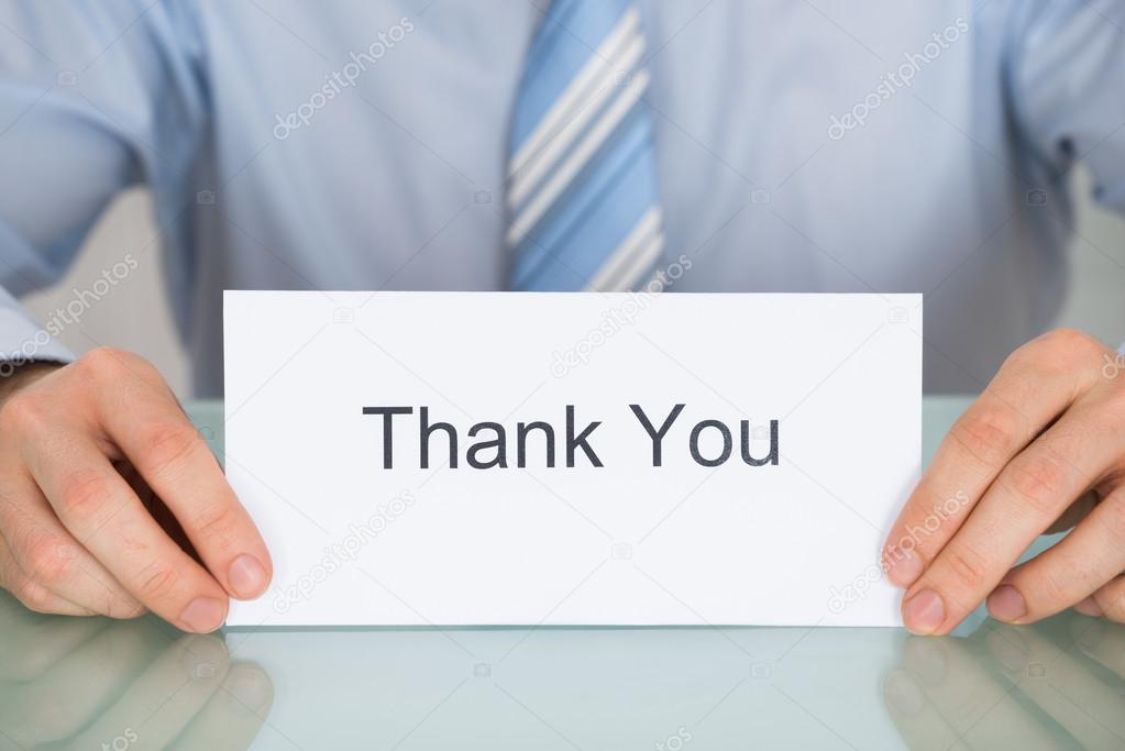 Businessman With Thank You Card