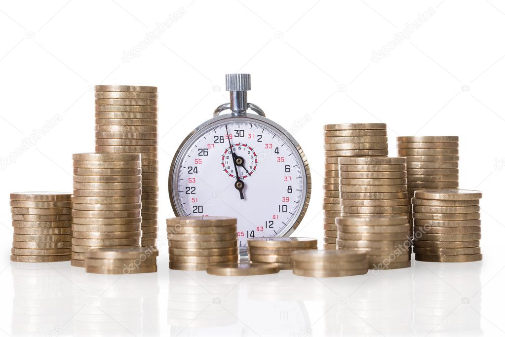 Stopwatch And Coin Stacks on white